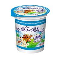 Pot de crème sure avec une vache peinte