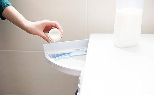 Balsam de înmuiere a materialului în mașina de spălat