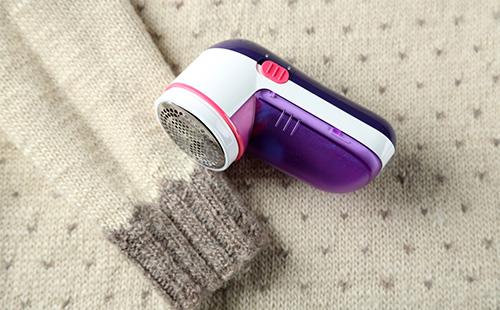 Máquina para quitar carretes de la ropa.