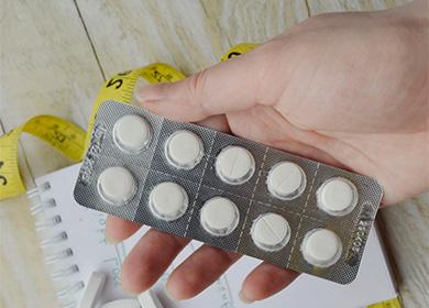Pilules blanches en paquet