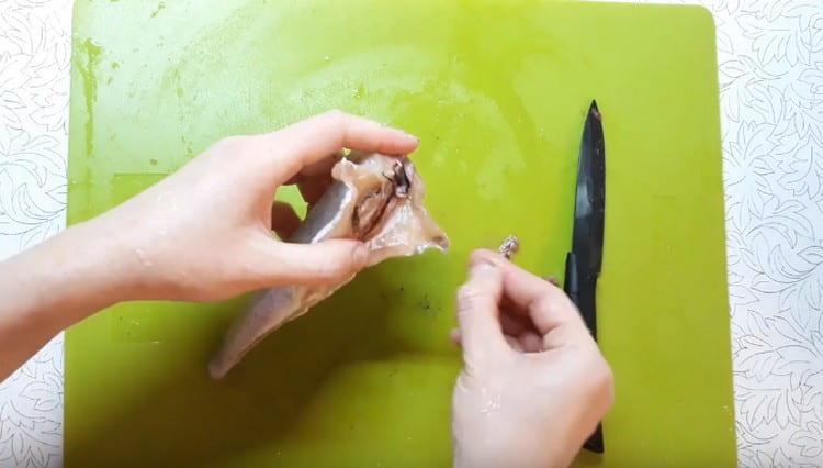 Netegem les carcasses de pollock.