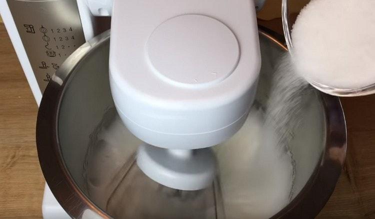 We add sugar to the whites a little while whipping.