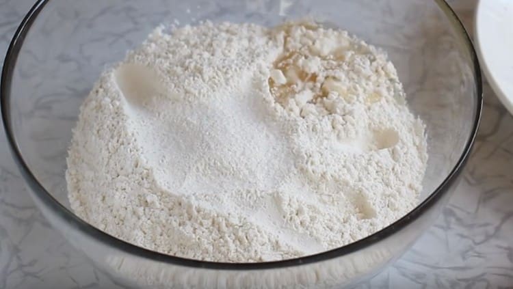 Add salt and vegetable oil to the flour.