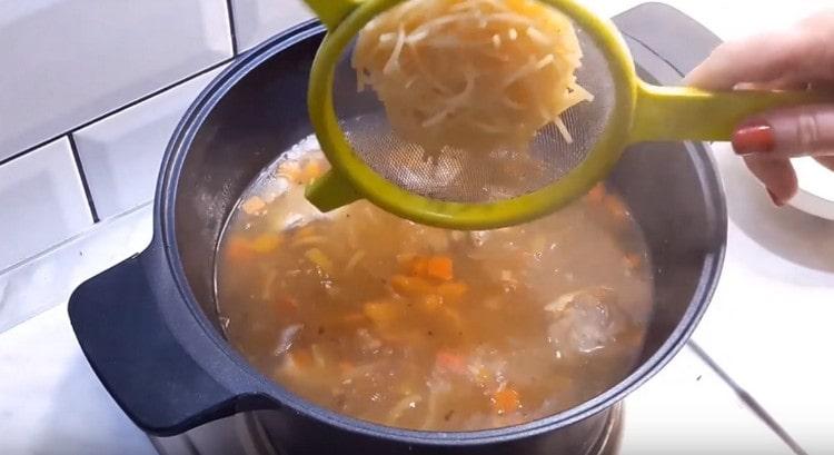 Add asparagus, as well as pre-cooked broken into pieces of spaghetti.