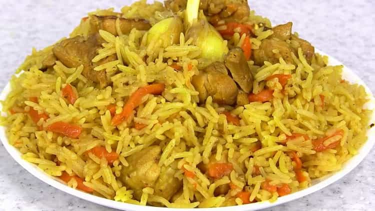 Delicious pilaf in a slow cooker with chicken is ready