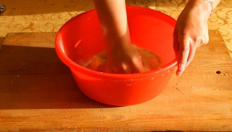 We crumble the rising dough.