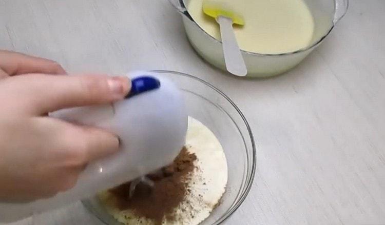 Dividiendo la masa por la mitad, agregue el cacao en una parte y mezcle.