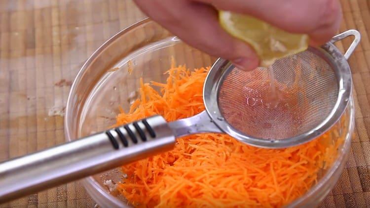 Sprinkle the carrots with the juice of half a lemon.