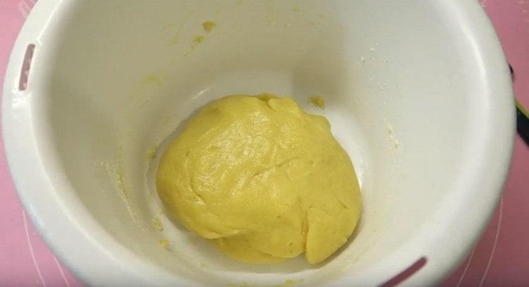 Add cottage cheese and knead the dough.