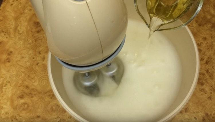 We introduce vegetable oil into the lush egg mass.