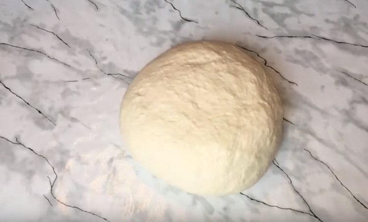 We collect the dough in a com.