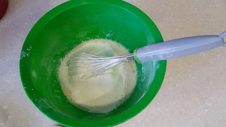 Sigt melet for at lave en kage med rosiner