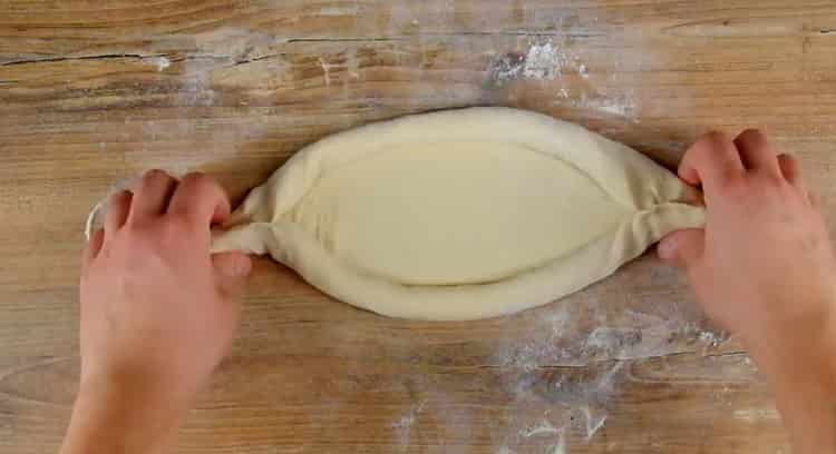 Pentru a face o barcă khachapuri, formați-vă