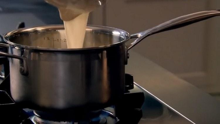 Heat milk with sugar.