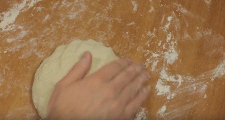Knead the soft dough.