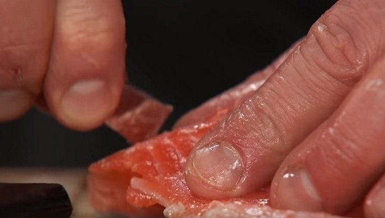 The remaining bones are removed with tweezers.