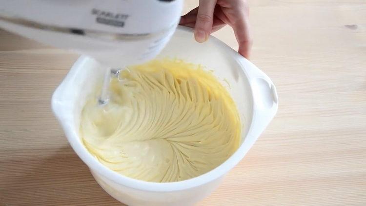 Mix the ingredients to make the cake.