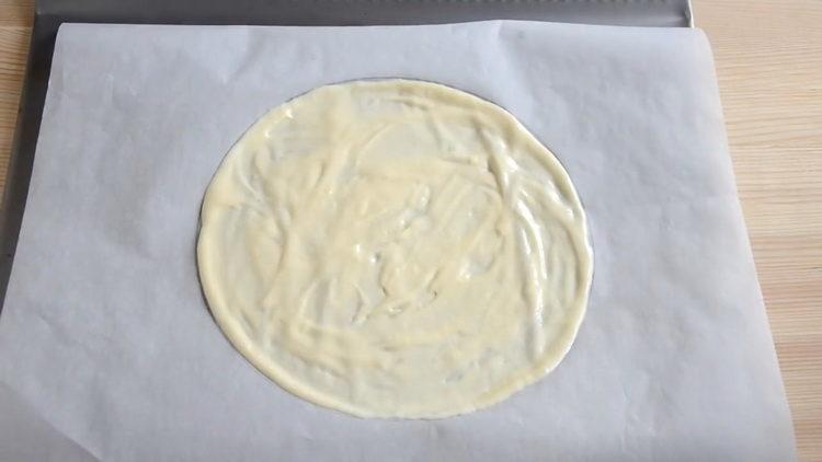 Lay out the dough to make a cake