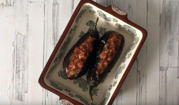 put the stuffing in the eggplant.