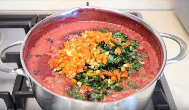 Add basil and pepper to the sauce.