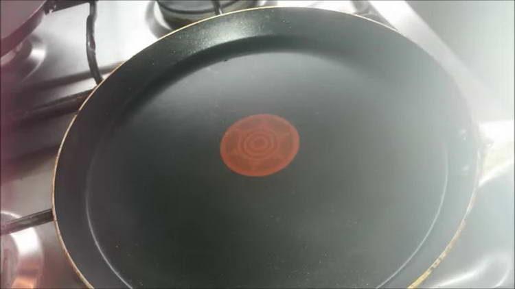 poseu una paella al foc