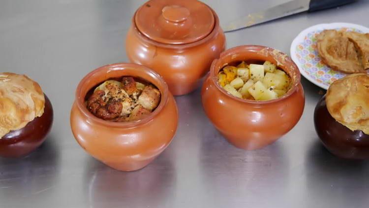 carn en pots amb patates al forn