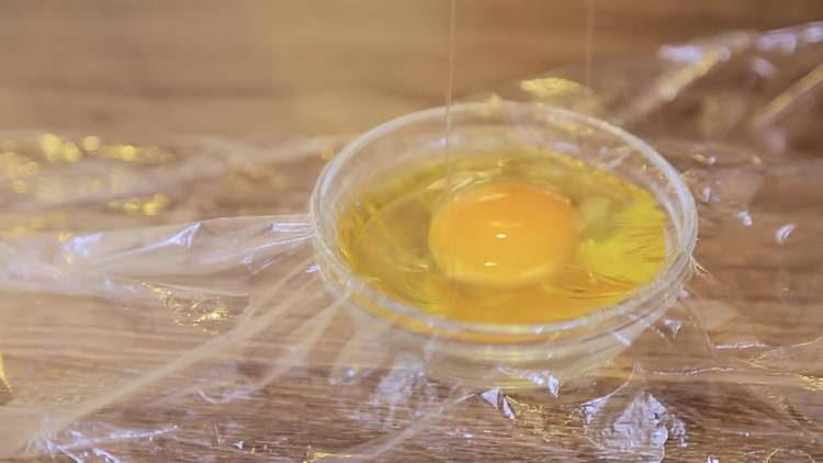 pour the egg on the film