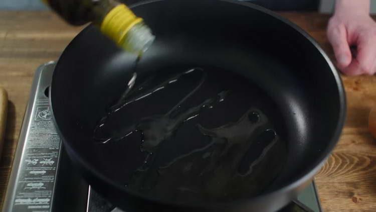pour oil into the pan
