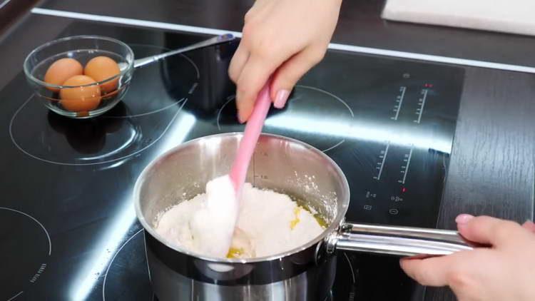 pour flour into the stewpan